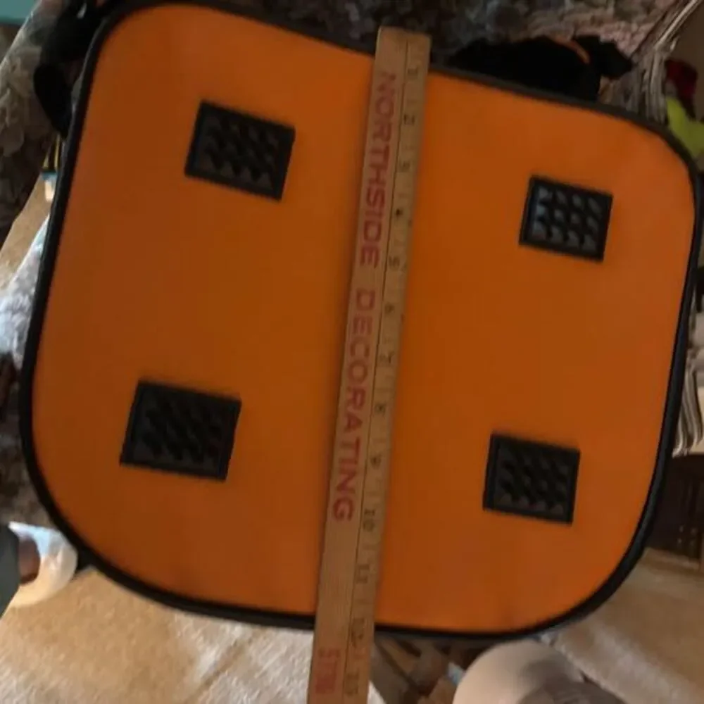 Orange and black soft-sided pet carrier, about 18x12x9 inches